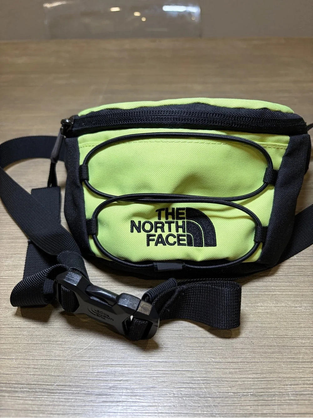 The North Face Jester Lumbar Pack in the lime Green and black